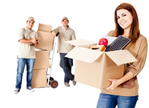 Packed boxes and furniture loaded into a removal van in Stanmore