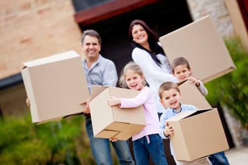 Packed boxes and furniture ready for transport