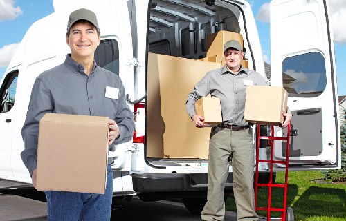 Professional movers handling furniture in Stanmore